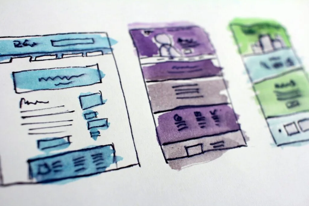 watercolor wireframe sketches of website layouts